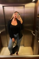 Caprice in a lift selfie 